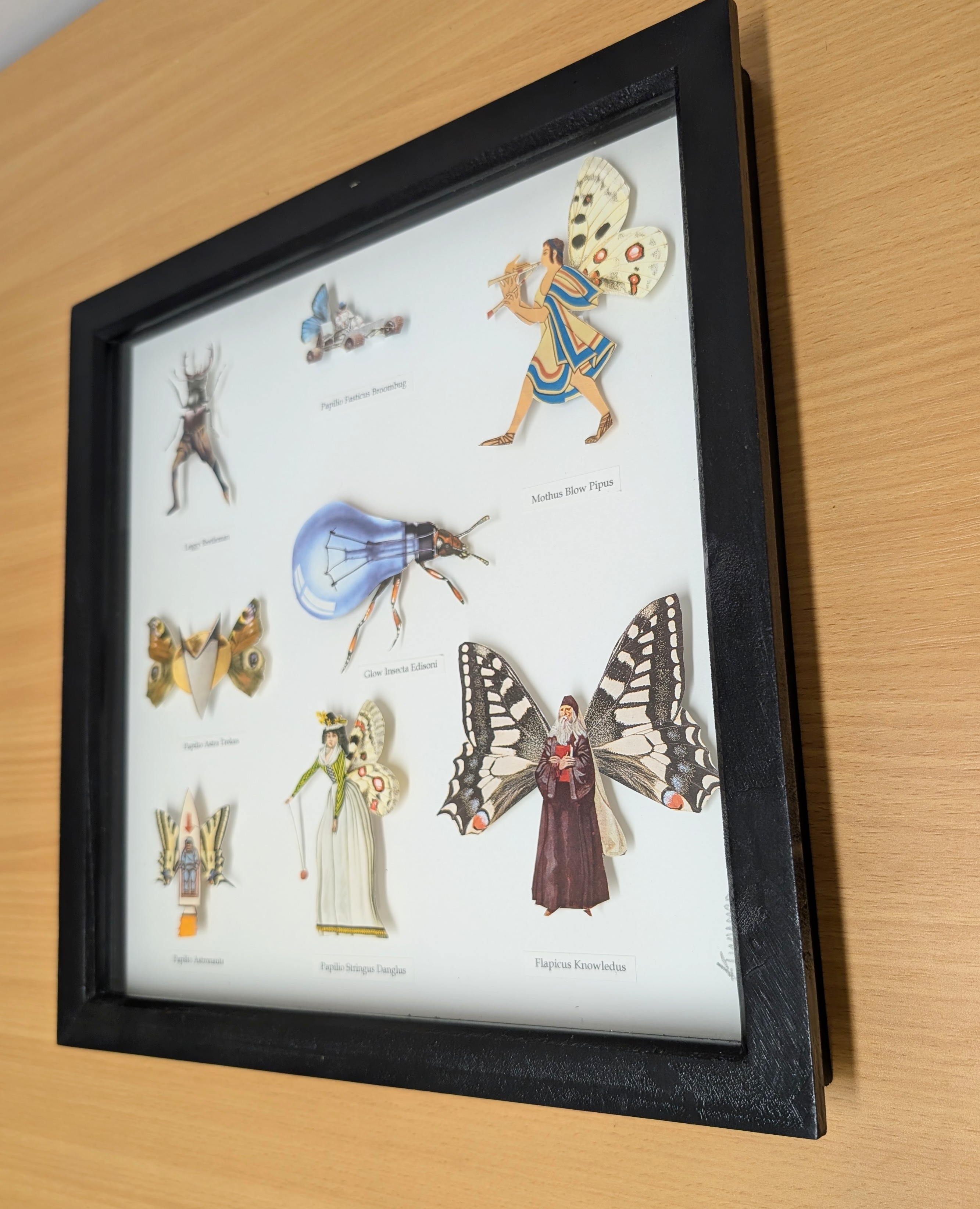 Whimsical collage artwork featuring figures with butterfly wings and fantastical beetle creatures